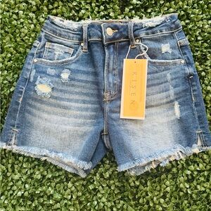 Risen Jeans: Blue Jean Shorts with Distressed Hem and Raw Edges